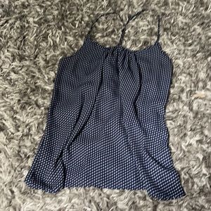 Navy blue and white polka doted shirt